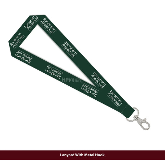 Green lanyard with metal hook on a white background