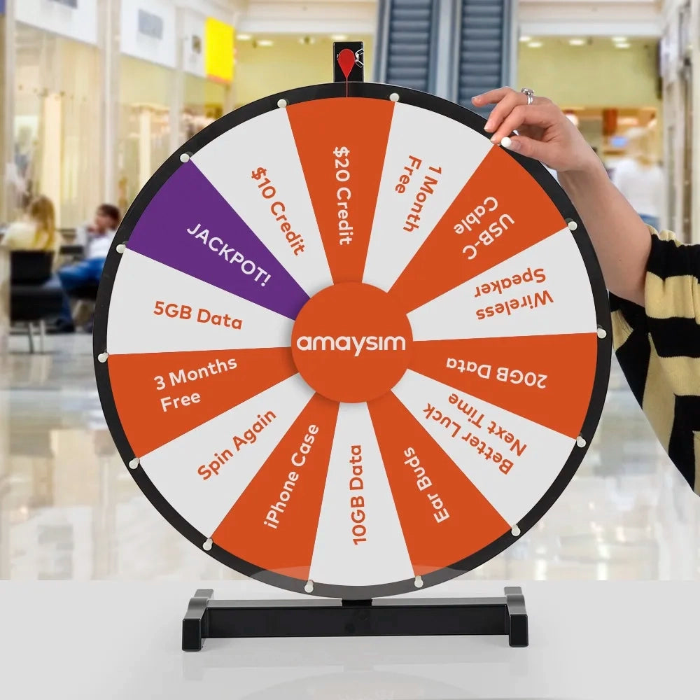 Wheel of fortune with various prizes and 'amaysim' branding in a mall setting.