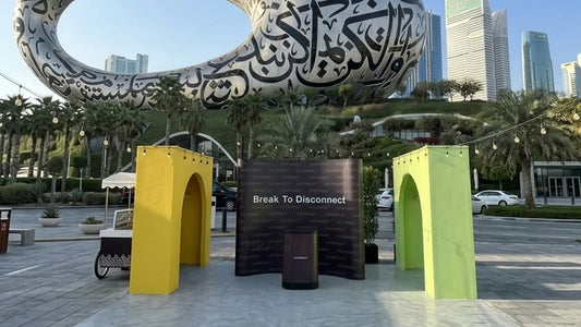 Curved pop-up stand positioned in front of the Museum of the Future in Dubai