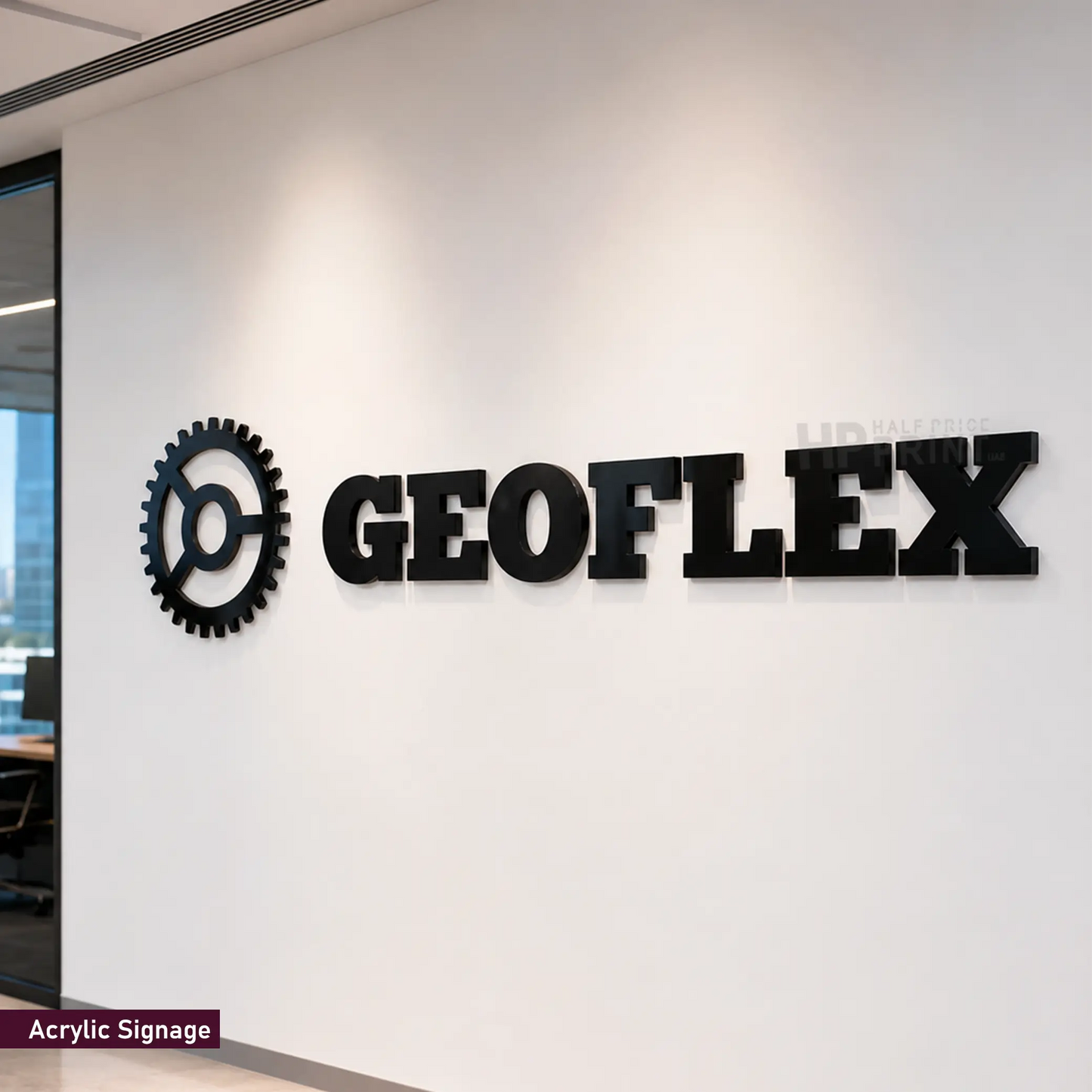 Black acrylic wall signage featuring a gear logo and the brand name 'GEOFLEX' mounted on a white office wall.