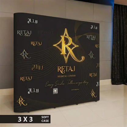 Black and gold display stand with Retaj Medical Center logo and branding.