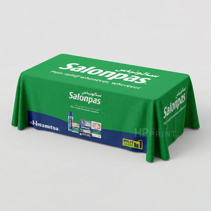 Green Salonpas branded tablecloth on a white background