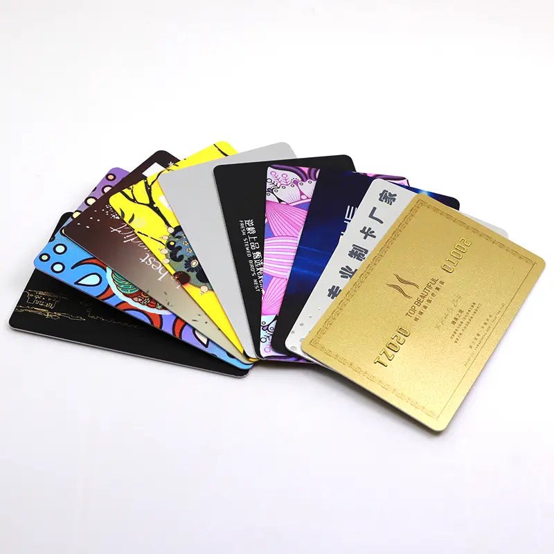 A collection of various membership cards fanned out, displaying different designs and colors.
