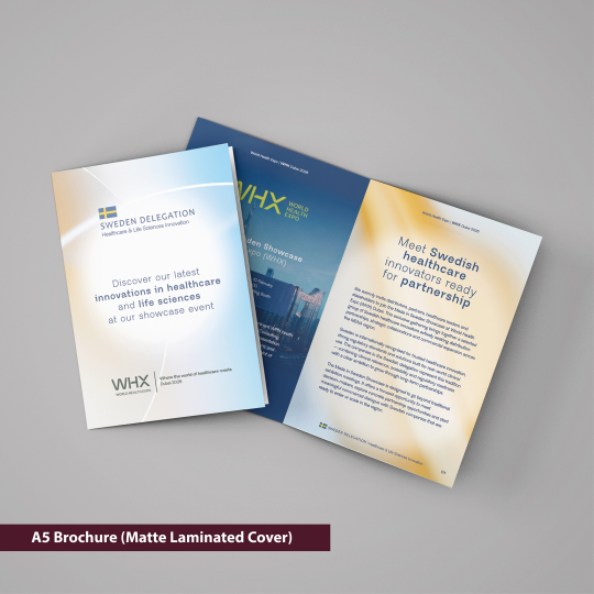 A5 brochure with matte laminated cover on a gray background