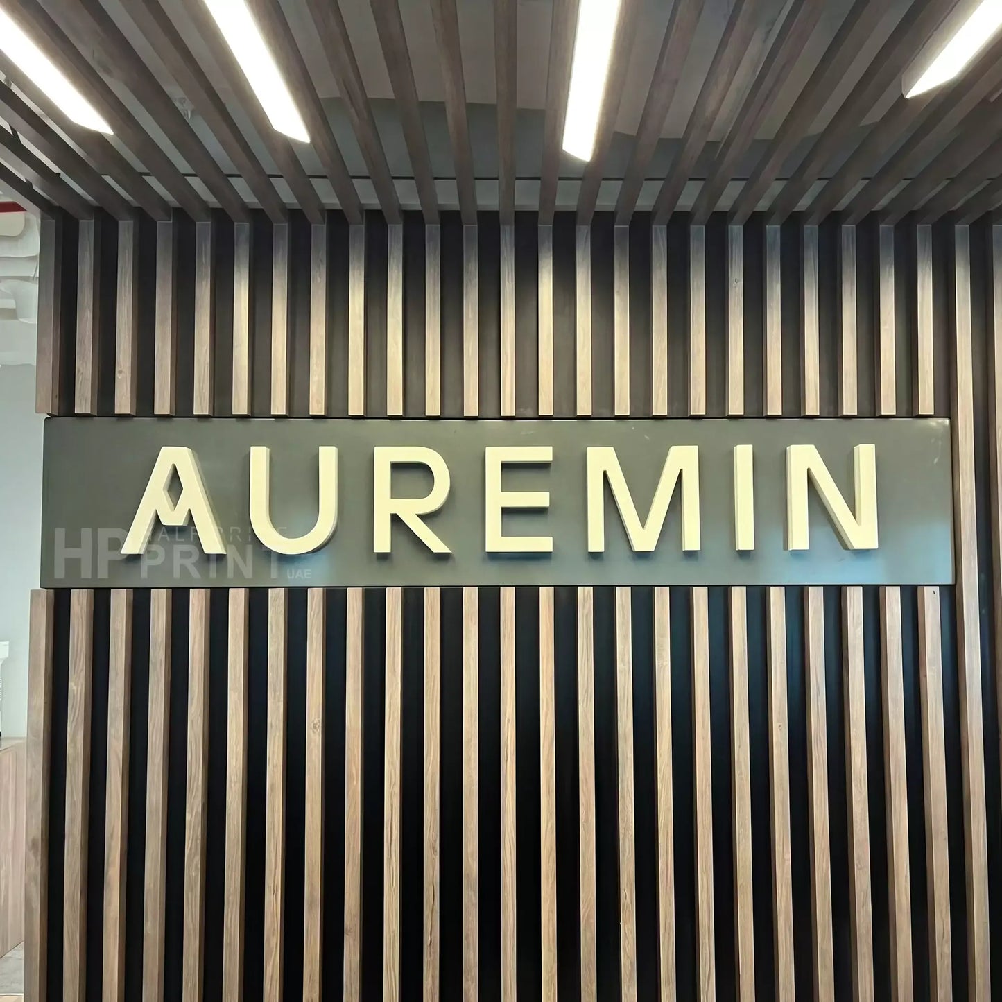Auremin sign on a modern architectural background