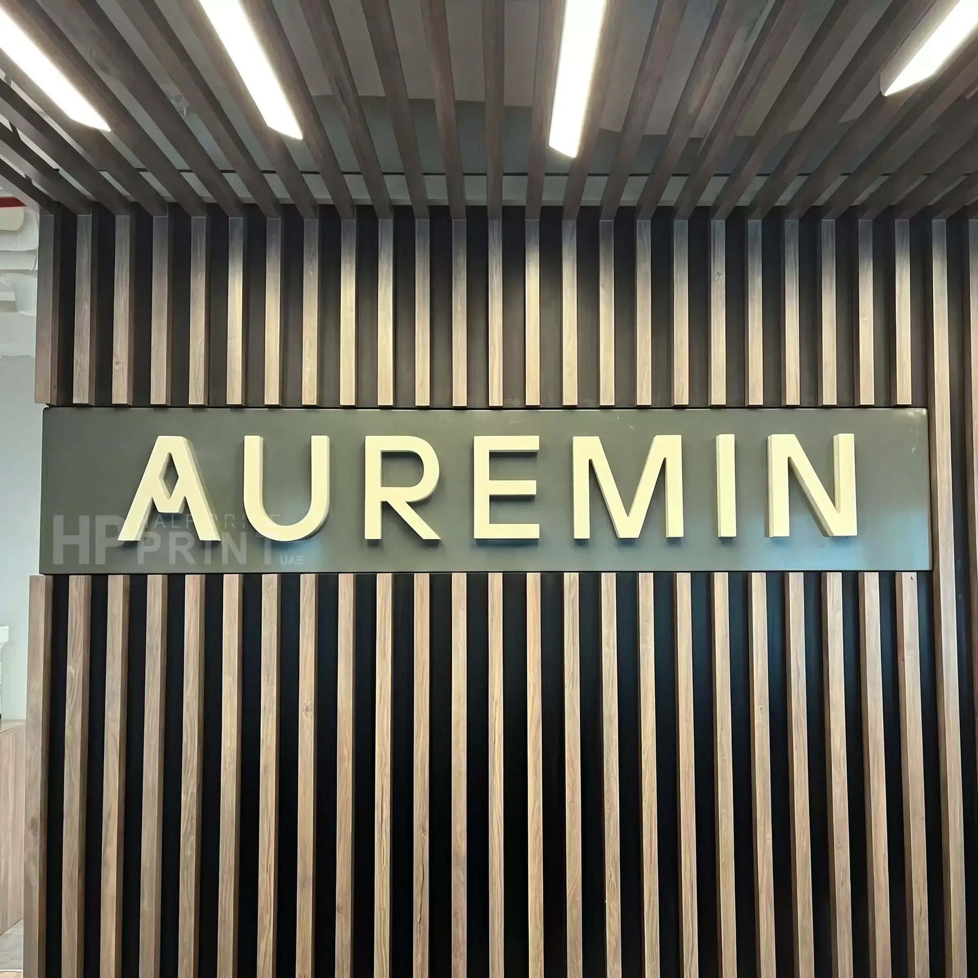 Auremin sign on a modern architectural background