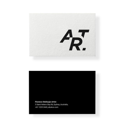 Two business cards with a logo and contact information on a white background