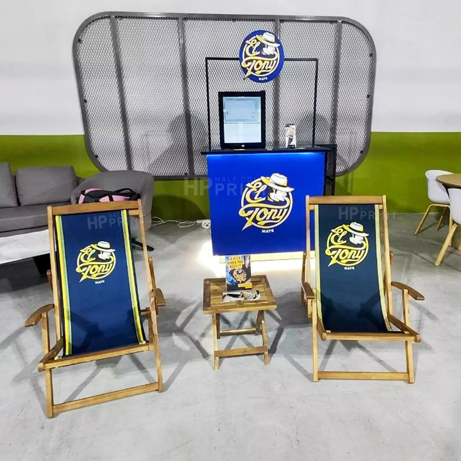 Outdoor BeachChair set with 'Happy Tony' branding in an indoor setting.