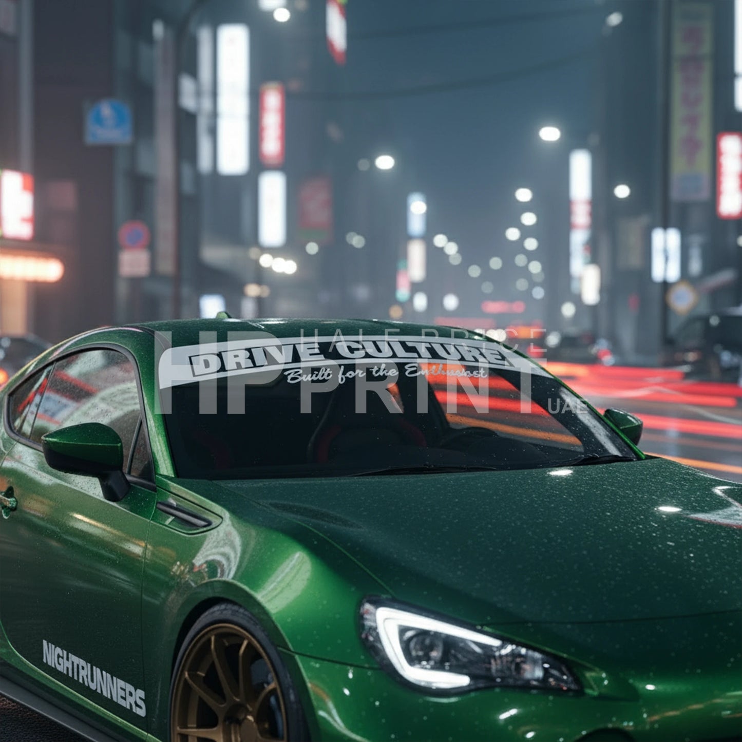 Green sports car on a city street at night with windshield stickers