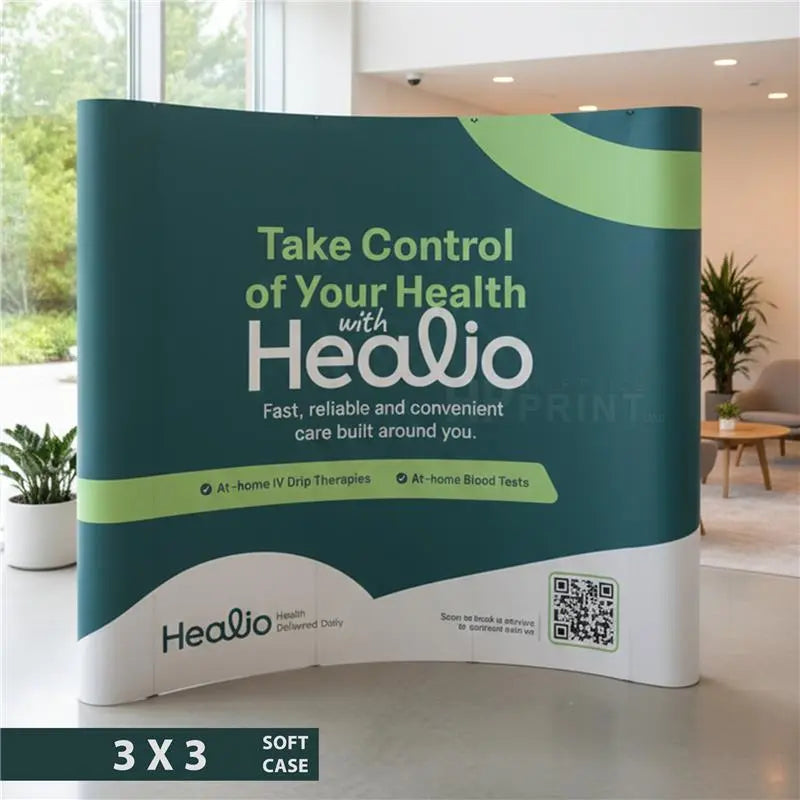Curved pop up stand for Healio with branding and text on a modern indoor setting.
