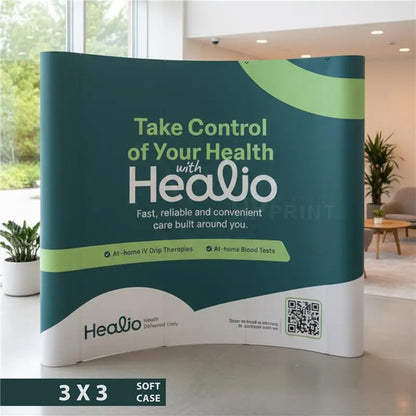 Curved pop up stand for Healio with branding and text on a modern indoor setting.