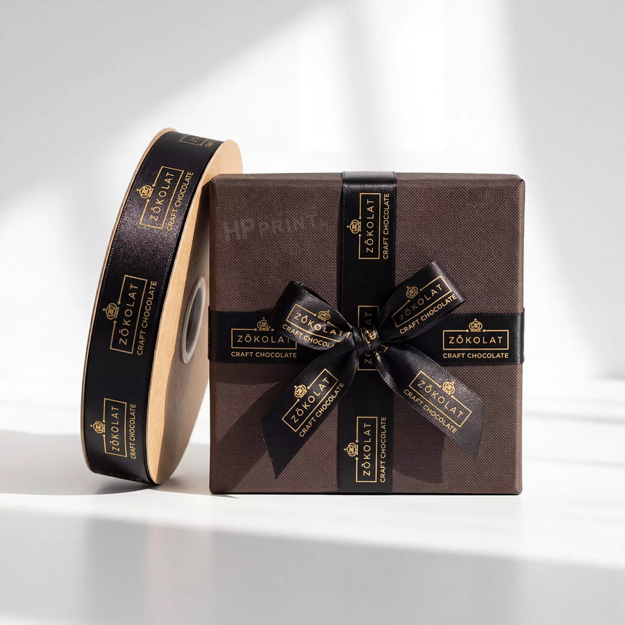 Zökolat chocolate box with branded ribbon on a white background