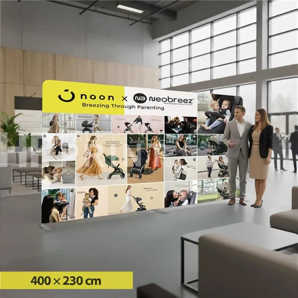 Promotional display for Neobreez with collage of images and branding in a modern office setting.