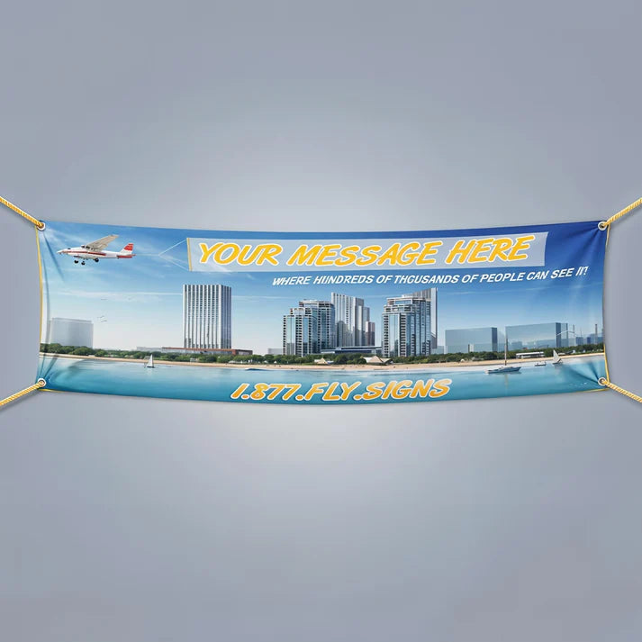 Promotional fabric banner with customizable text over a cityscape background