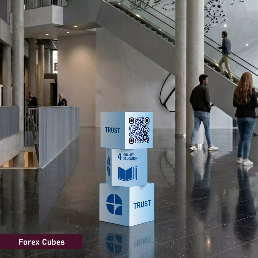 Blue Forex Cubes with 'Trust' and QR code in a modern indoor setting