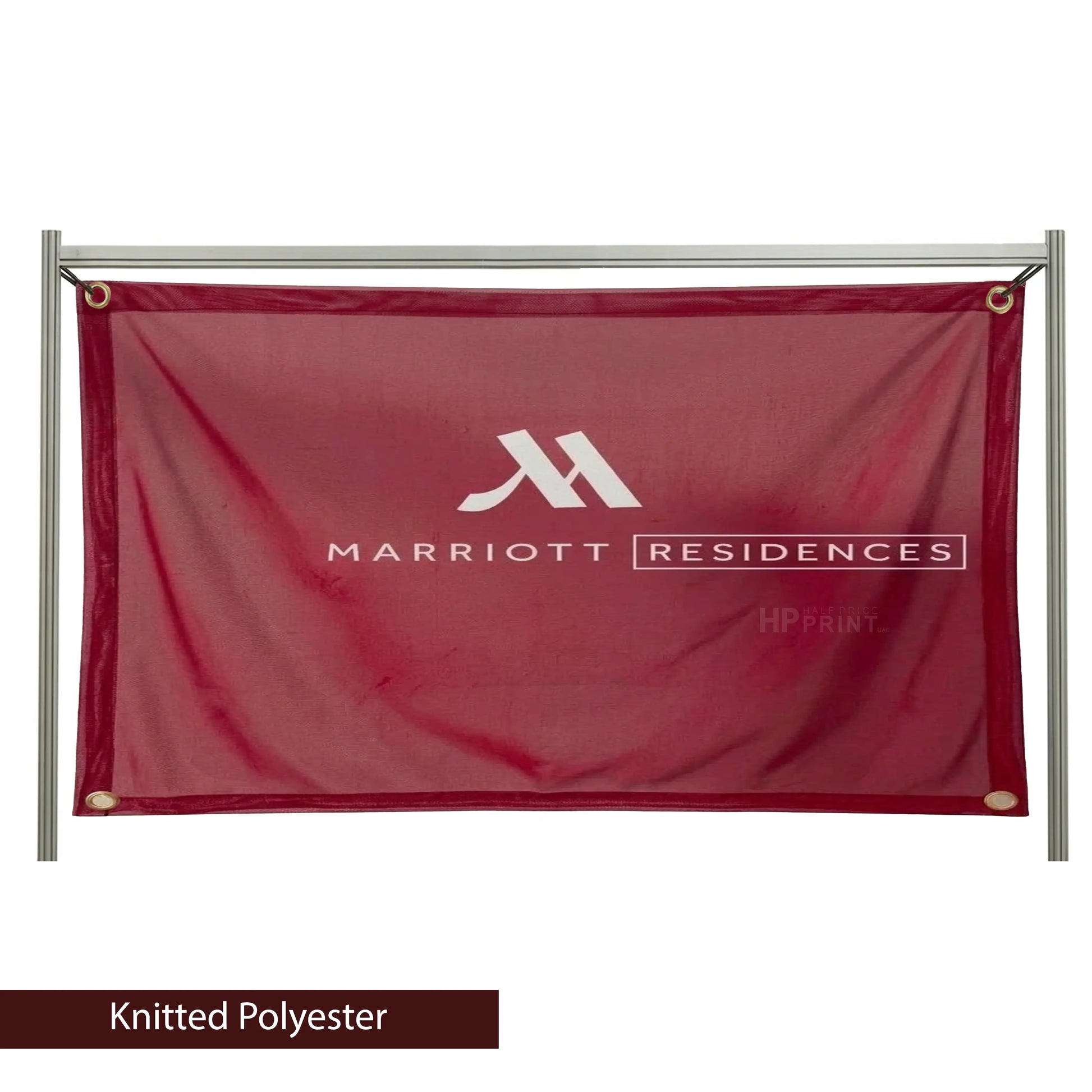 Red Marriott Residences banner on a stand with 'Knitted Polyester' text below.