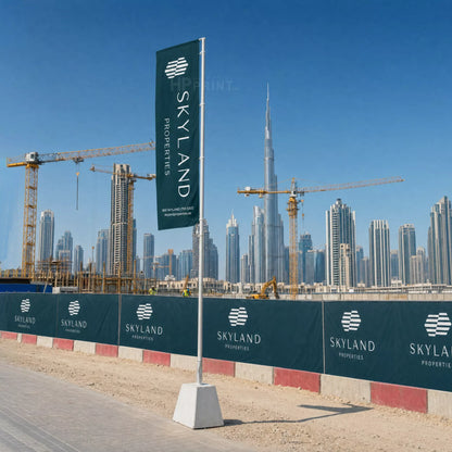 Construction site with Skyleand Properties banner and skyline in the background