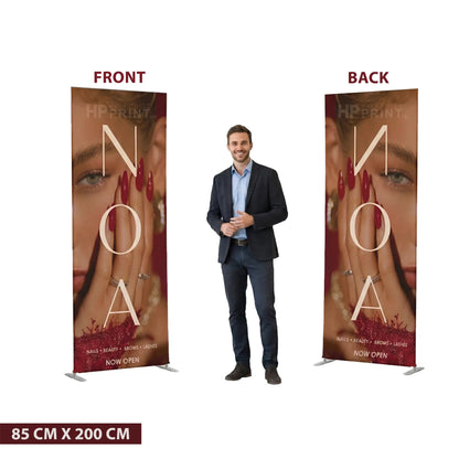 Two banner stands with 'NOA' branding, one front and one back view, with a man standing between them.