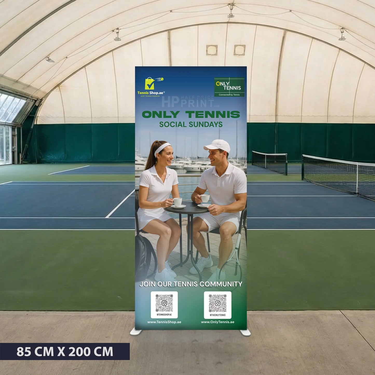Tennis-themed promotional banner on a tennis court