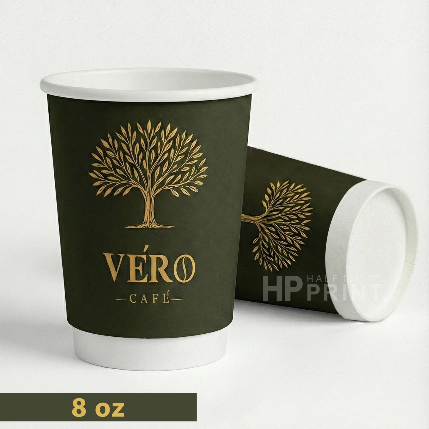 Dark green paper cup with white lid and interior, featuring 'Véro Cafe' logo on a white background.