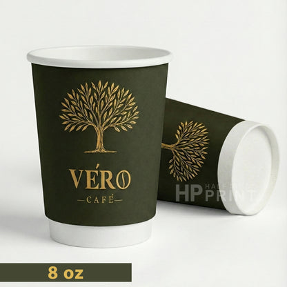 Dark green paper cup with white lid and interior, featuring 'Véro Cafe' logo on a white background.