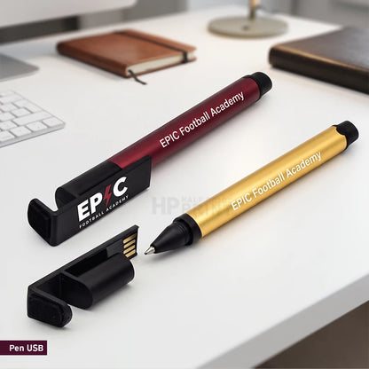 Two EPIC Football Academy USB pen drives on a white desk, one in metallic gold and one in metallic burgundy, each with a black USB connector, alongside a black EPIC stand.