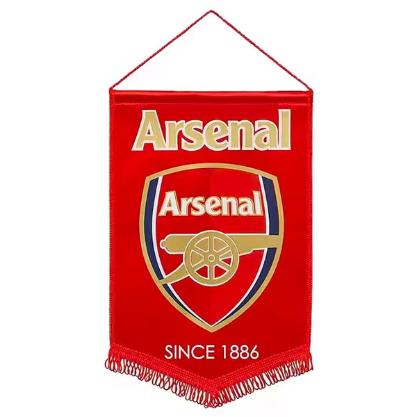 Red Arsenal FC pennant flag featuring the club crest with cannon emblem and ‘Since 1886’ text, finished with a hanging cord and tasselled bottom edge.