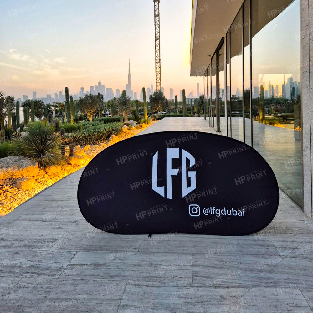 Black banner with 'LFG' and '@lfgdubai' text on a modern building exterior.
