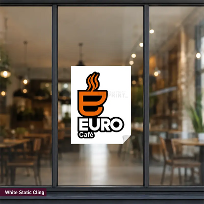 A white rectangular static cling with the Euro Café logo applied to a glass window in a blurred cafe interior. The sticker is labeled as a White Static Cling in the bottom-left corner.