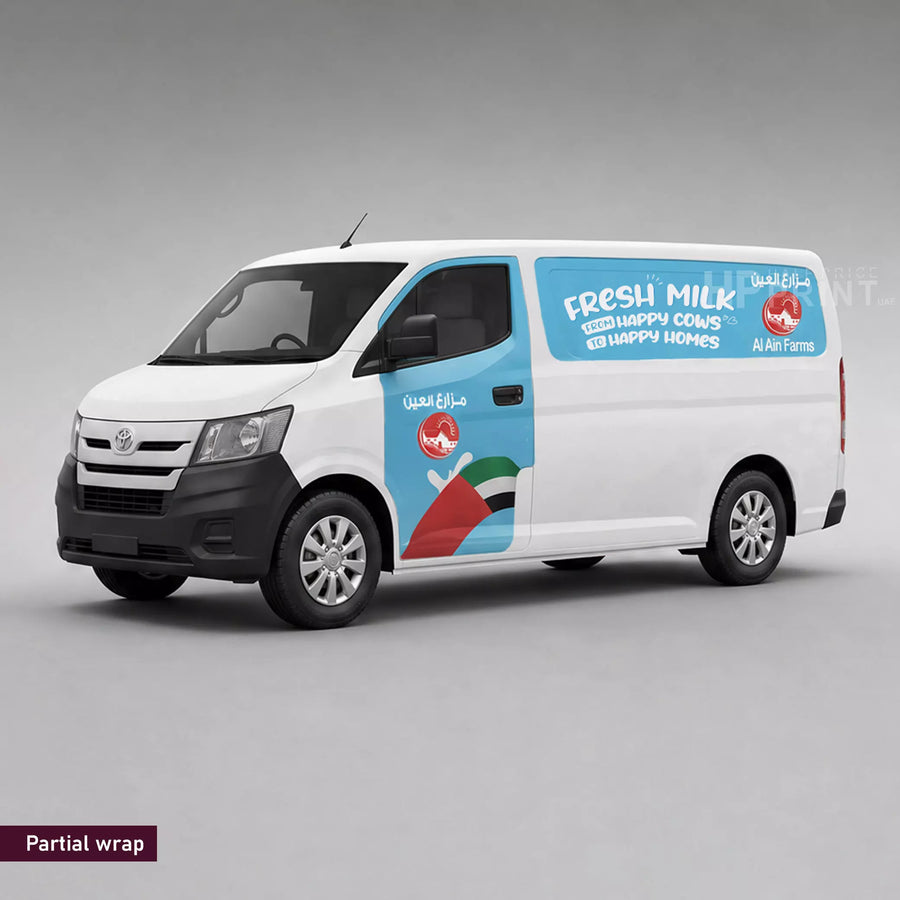 White van with a partial brand wrap on a gray background